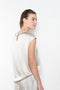 The Round Neck Sleeveless Top by LISA YANG in a woven satin silk, has a neat rounded neckline and relaxed fit silhouette