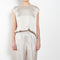 The Round Neck Sleeveless Top by LISA YANG in a woven satin silk, has a neat rounded neckline and relaxed fit silhouette