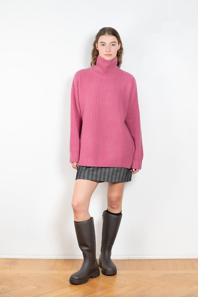 The Therese Sweater by Lisa Yang has a relaxed silhouette with a loose high neck