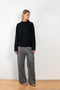 The Baltra Sweater by Loulou Studio is a relaxed long sleeve sweater in a soft cashmere