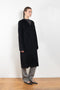 The Banie Coat by Loulou Studio is a straight coat with minimal lines and detailed with a fine leather strap