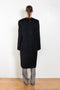 The Banie Coat by Loulou Studio is a straight coat with minimal lines and detailed with a fine leather strap