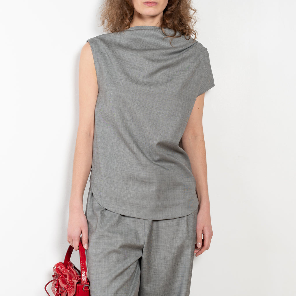 The Cove Trouser by Loulou Studio are relaxed suiting paints in a soft virgin chambray wool that sit on the waist