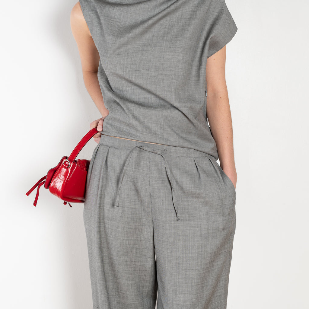 The Cove Trouser by Loulou Studio are relaxed suiting paints in a soft virgin chambray wool that sit on the waist