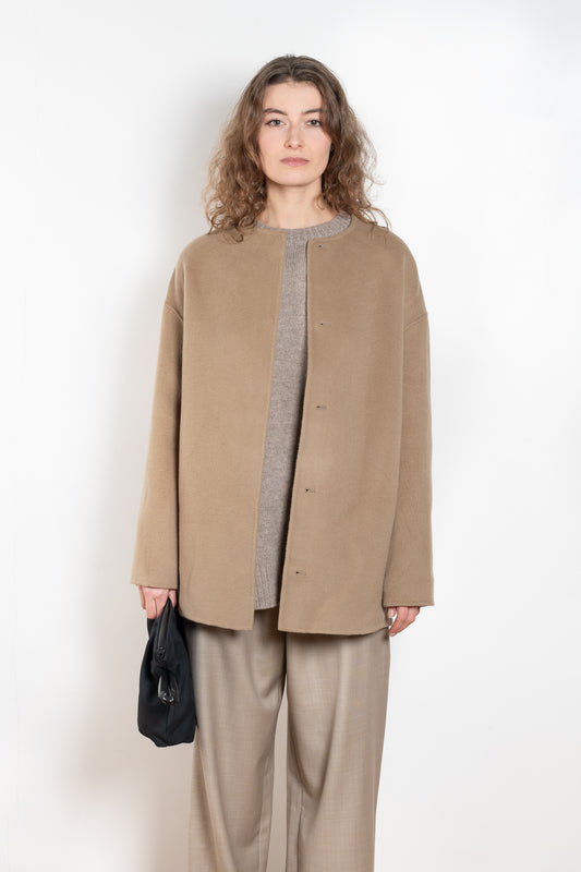 The Gio Coat by Loulou Studio is a round neck straight coat with minimal lines and an invisible closure