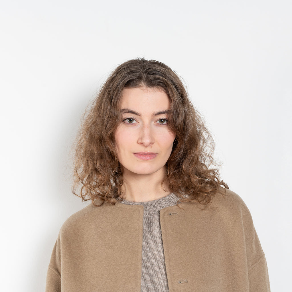 The Gio Coat by Loulou Studio&nbsp;is a round neck straight coat with minimal lines and an invisible closure