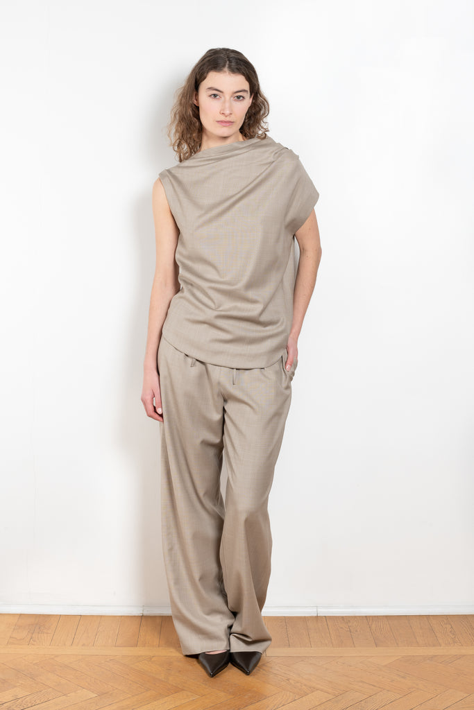 The Lyra Top by Loulou Studio is a sleeveless top with draped details in a lightweight virgin wool