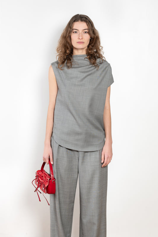 The Lyra Top by Loulou Studio is a sleeveless top with draped details in a lightweight virgin wool