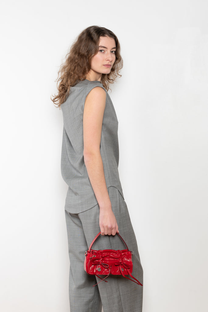 The Lyra Top by Loulou Studio is a sleeveless top with draped details in a lightweight virgin wool