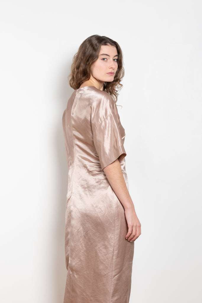 The Ruby Dress by Loulou Studio is an elegant short sleeved fitted dress in a silk satin fabric