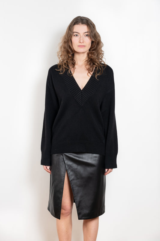 The Sage Sweater by Loulou Studio is an oversized sweater with an ample fit, a deep V, dropped shoulders and ribbed details