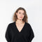 The Sage Sweater by Loulou Studio is an oversized sweater with an ample fit, a deep V, dropped shoulders and ribbed details