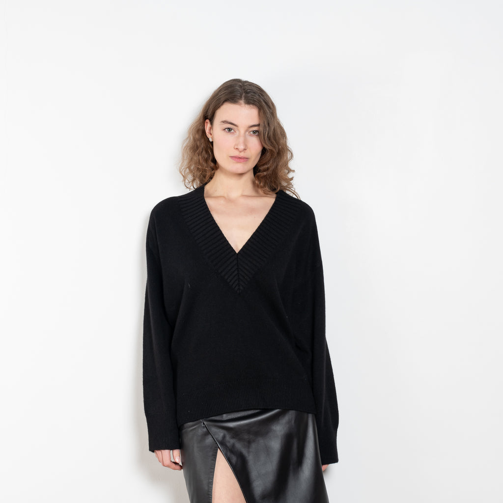 The Sage Sweater by Loulou Studio is an oversized sweater with an ample fit, a deep V, dropped shoulders and ribbed details