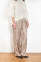 The Alera Trouser by Loulou Studio is a trouser with a relaxed fit in a fluid and lightweight summer silk