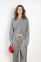 The Anzor Sweater by Loulou Studio has a slightly cropped ample fit with dropped shoulders and long sleeves in cashmere