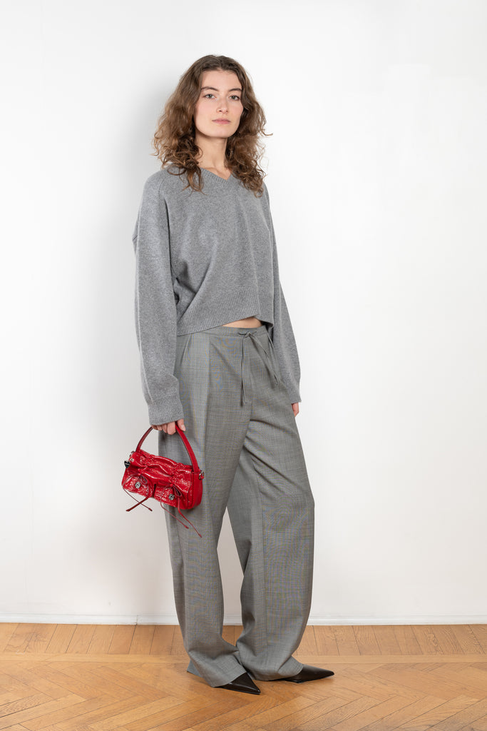 The Anzor Sweater by Loulou Studio has a slightly cropped ample fit with dropped shoulders and long sleeves in cashmere