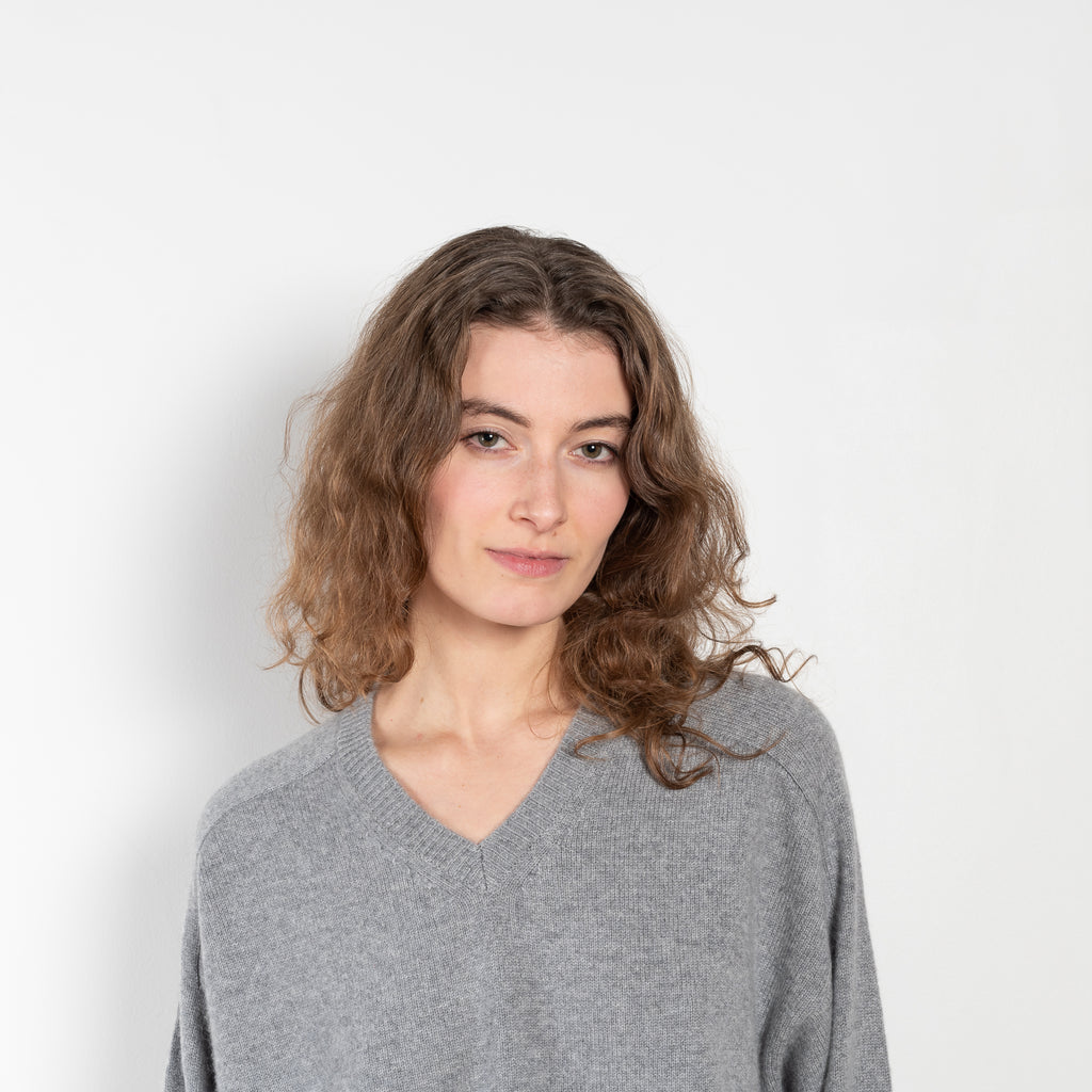 The Anzor Sweater by Loulou Studio has a slightly cropped ample fit with dropped shoulders and long sleeves in cashmere