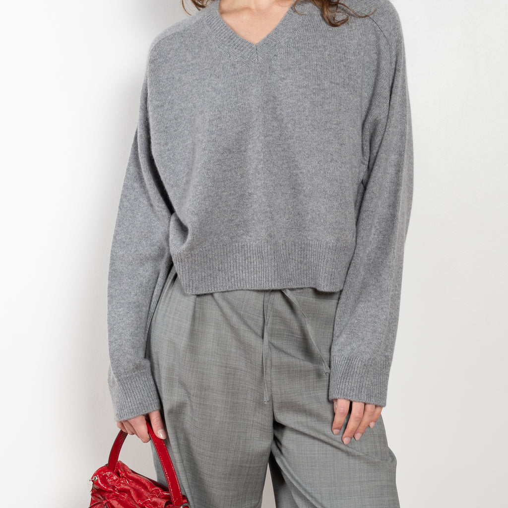 The Anzor Sweater by Loulou Studio has a slightly cropped ample fit with dropped shoulders and long sleeves in cashmere