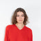 The Anzor Sweater by Loulou Studio has a slightly cropped ample fit with dropped shoulders and long sleeves in cashmere