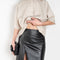 The Ekare Skirt by Loulou Studio is a mid waist slit skirt in a kine lambskin leather