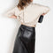 The Ekare Skirt by Loulou Studio is a mid waist slit skirt in a kine lambskin leather