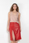 The Ekare Skirt by Loulou Studio is a mid waist slit skirt in a fine lambskin leather