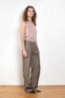 The Sbiru Pants by Loulou Studio are signature suiting paints that sit on the waist, are ample and pleated at the waist