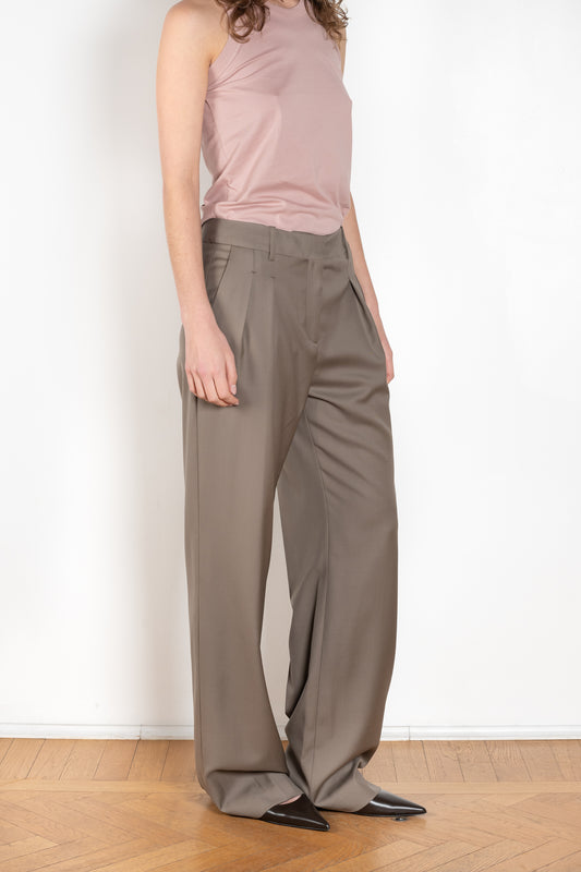 The Sbiru Pants by Loulou Studio are signature suiting paints that sit on the waist, are ample and pleated at the waist