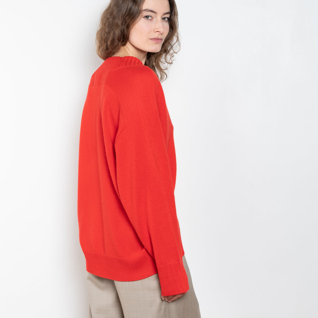 The Sage Sweater by Loulou Studio is an oversized sweater with an ample fit, a deep V, dropped shoulders and ribbed details