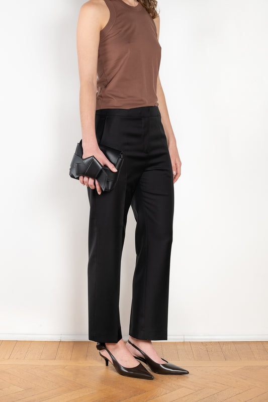 The Sofe Trouser by Loulou Studio are cropped pants with a straight fit in a soft virgin chambray wool