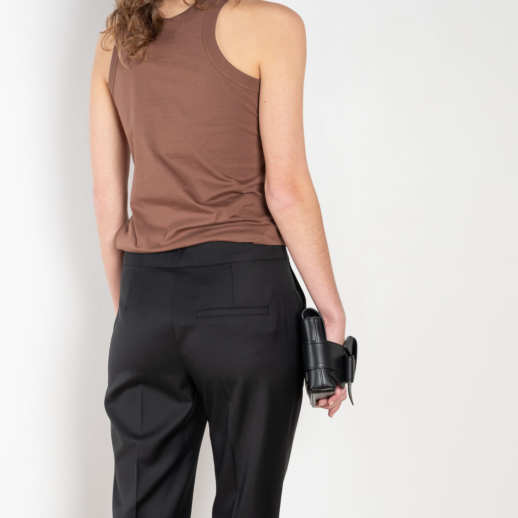 The Sofe Trouser by Loulou Studio are cropped pants with a straight fit in a soft virgin chambray wool