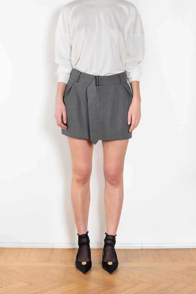 The Belted Mini Skirt by Magda Butrym is an ultra-short, low-waisted mini skirt with a belted waist, perfect for adding a touch of flair to any outfit