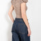 The Belted Loose Denim by Magda Butrym are loose-fit navy denim pants with a wide leg