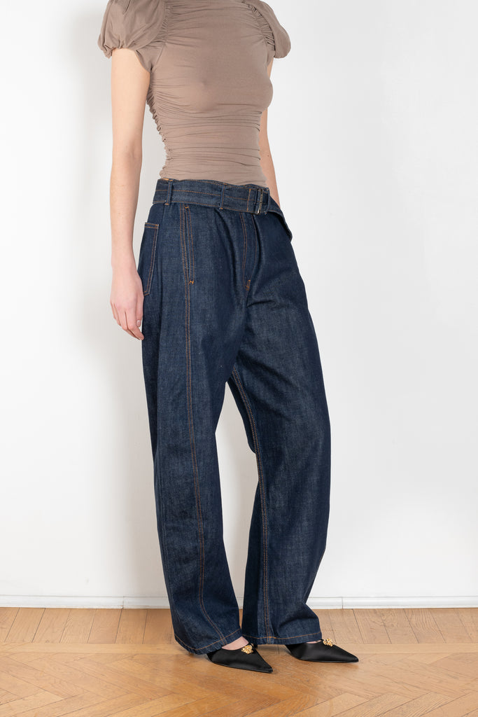 The Belted Loose Denim by Magda Butrym are loose-fit navy denim pants with a wide leg