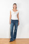 The Flare Denim by Magda Butrym is a low waist, rigid cotton denim with elongated flare legs