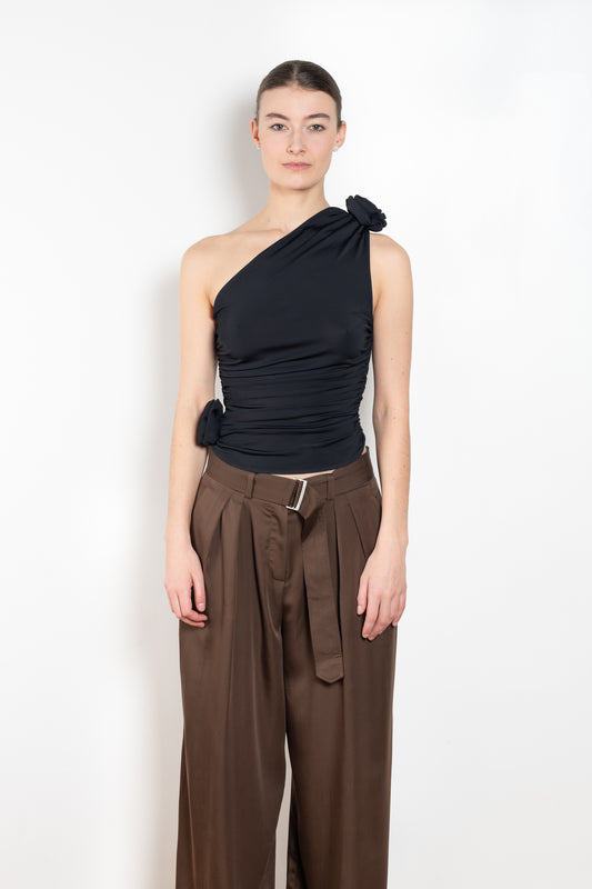 The Off Shoulder Top by Magda Butrym is a lightweight, one-shoulder asymmetrical top with ruched detailing and 3D roses