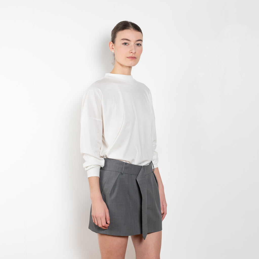 The Oversized Longsleeve Tee by Magda Butrym is an oversized Tshirt with long sleeves and a MB Rose logo in the neck