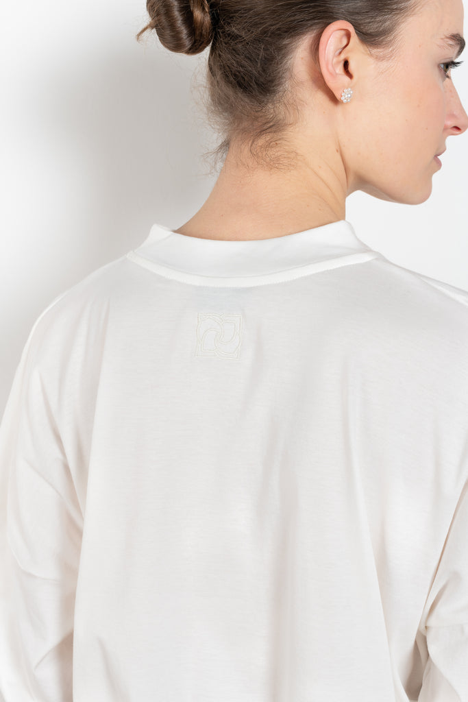 The Oversized Longsleeve Tee by Magda Butrym is an oversized Tshirt with long sleeves and a MB Rose logo in the neck