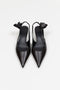 The Slingback Kitten Heels by Magda Butrym are classic pointed toe slingbacks with a small rosette embellishment at the heel. Kitten heels. Made in Italy