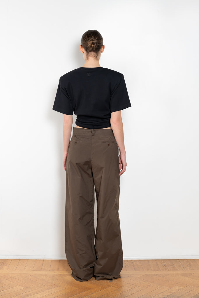 The Belted Relaxed Trouser by Magda Butrym are loose-fitting cotton trousers with front and back pockets, combining luxury with an easygoing, relaxed fit