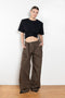 The Belted Relaxed Trouser by Magda Butrym are loose-fitting cotton trousers with front and back pockets, combining luxury with an easygoing, relaxed fit