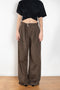 The Belted Relaxed Trouser by Magda Butrym are loose-fitting cotton trousers with front and back pockets, combining luxury with an easygoing, relaxed fit