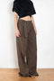 The Belted Relaxed Trouser by Magda Butrym are loose-fitting cotton trousers with front and back pockets, combining luxury with an easygoing, relaxed fit