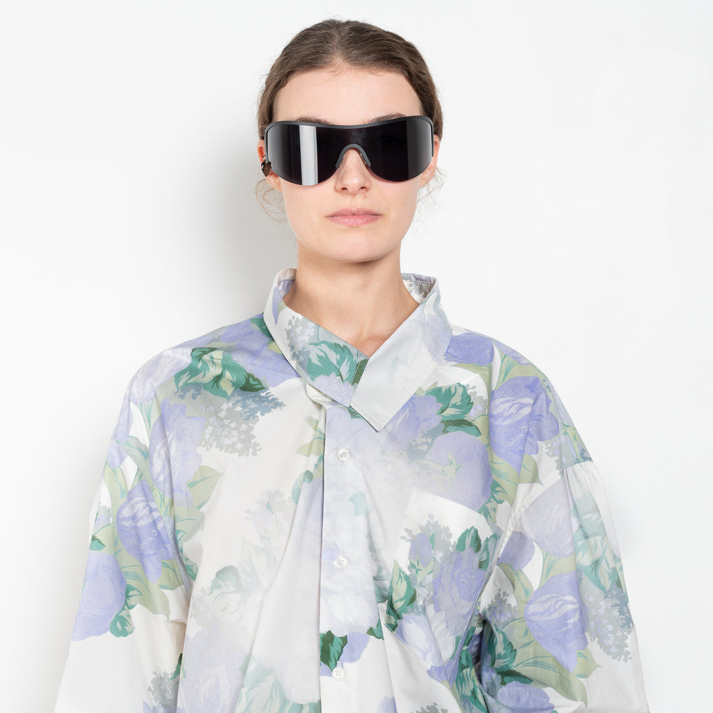 The Boule Shirt by Meryll Rogge is an oversized shirt with a ruffled details on the back in a seasonal floral print