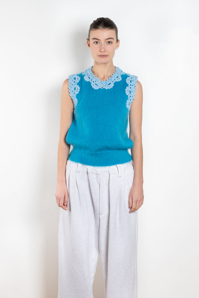 The Crochet Vest by Meryll Rogge is a showstopping runway piece, a sleeveless vest in a blue mohair with embellished crochet details