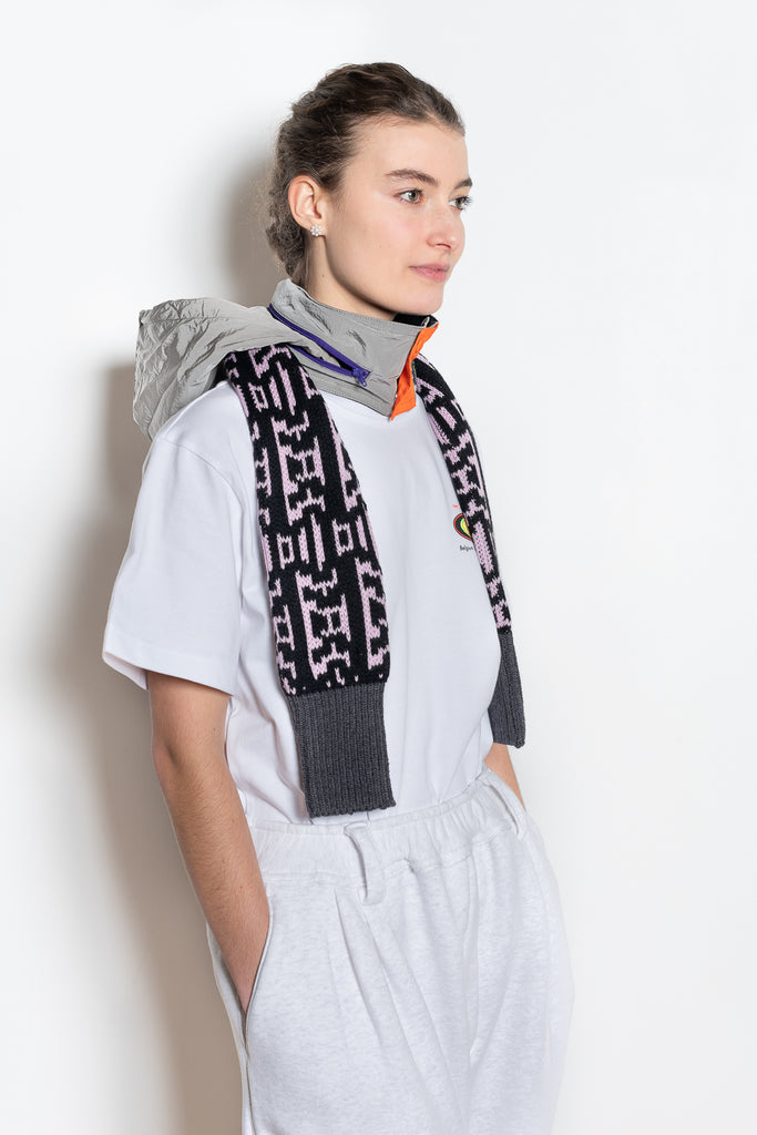 The Hood & Scarf Turtleneck by Meryll Rogge is a signature accessory, a wool scarf with a nylon collar with inserted hood all in one