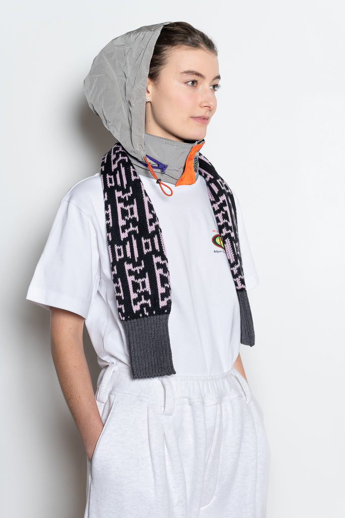 The Hood &amp; Scarf Turtleneck by Meryll Rogge is a signature accessory, a wool scarf with a nylon collar with inserted hood all in one