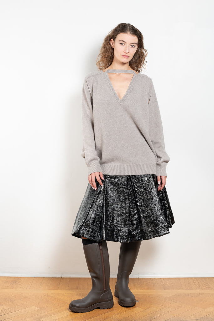 The Lacquered Pleated Skirt by Meryll Rogge is mid waist pleated skirt in lacquered coated cotton