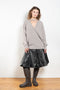 The Lacquered Pleated Skirt by Meryll Rogge is mid waist pleated skirt in lacquered coated cotton