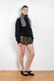 The Track Shorts by Meryll Rogge is a nylon mini short with track and color block detailing